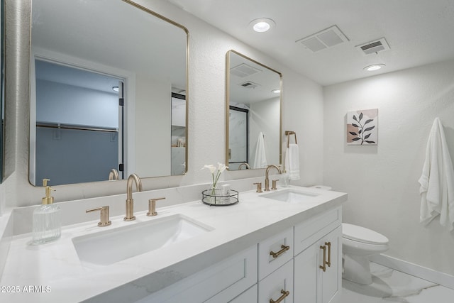 1021 S Almar Cir, Mesa, AZ 85204 - bathroom with double vanity, marble look tile flooring, toilet, and baseboards