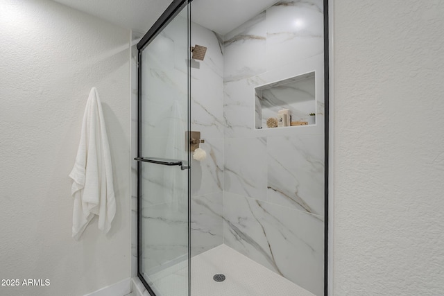 1021 S Almar Cir, Mesa, AZ 85204 - full bathroom featuring a marble finish shower and a textured wall