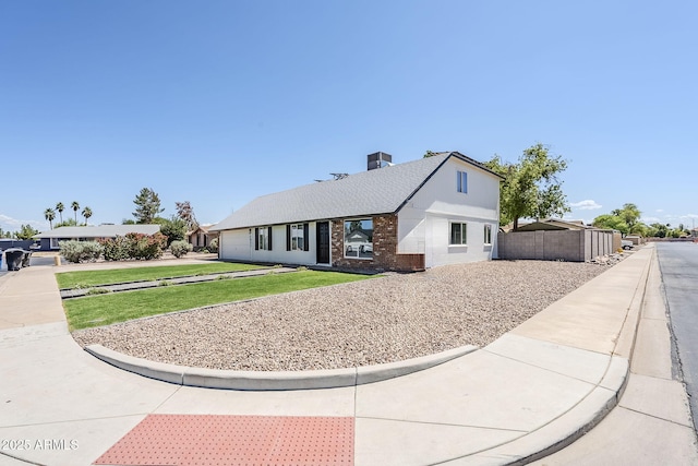 1021 S Almar Cir, Mesa, AZ 85204 - view of front facade featuring brick siding and a chimney