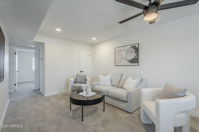 1021 S Almar Cir, Mesa, AZ 85204 - living area featuring light colored carpet, baseboards, a ceiling fan, and recessed lighting