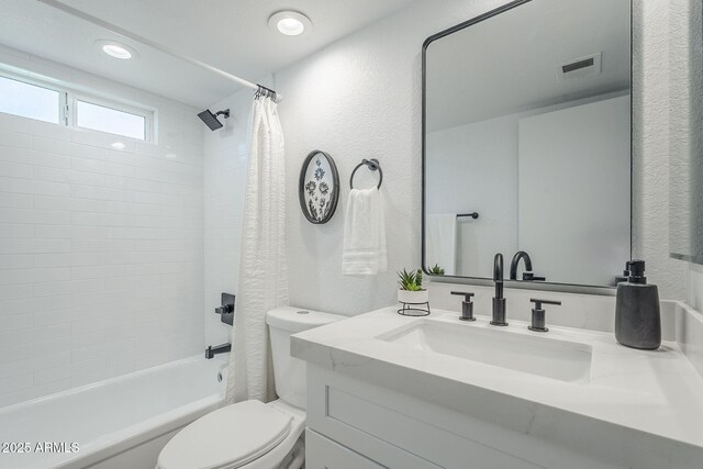 1021 S Almar Cir, Mesa, AZ 85204 - full bath with toilet, vanity, shower / bathtub combination with curtain, and a textured wall