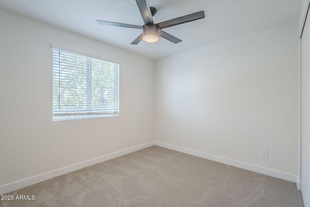 1021 S Almar Cir, Mesa, AZ 85204 - unfurnished room with light colored carpet, ceiling fan, and baseboards
