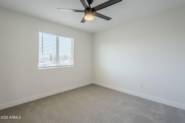 1021 S Almar Cir, Mesa, AZ 85204 - spare room featuring light colored carpet, a ceiling fan, and baseboards
