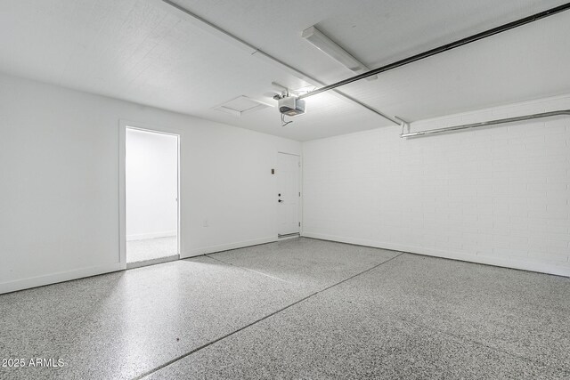 1021 S Almar Cir, Mesa, AZ 85204 - garage with a garage door opener and baseboards