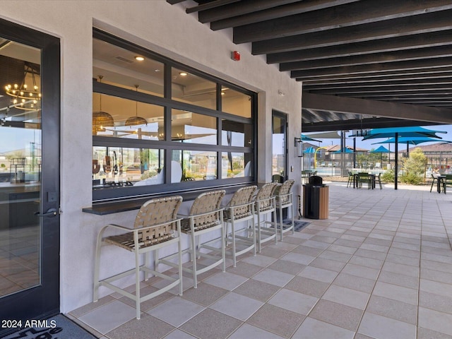 view of patio / terrace featuring exterior bar