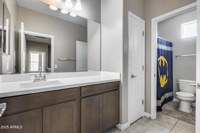 bathroom featuring vanity, tile patterned floors, toilet, and a shower with shower curtain