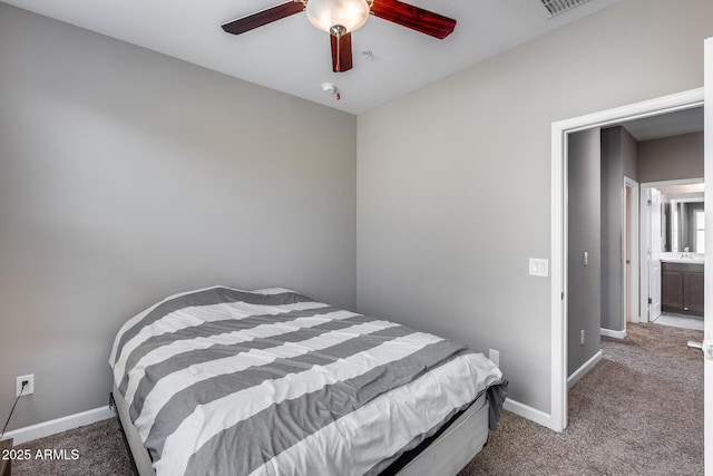 carpeted bedroom featuring a ceiling fan and baseboards