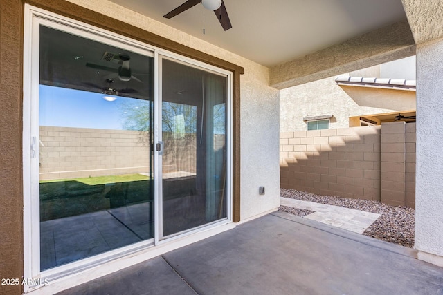 view of patio featuring visible vents, a ceiling fan, and fence