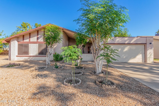 view of front of home with a garage