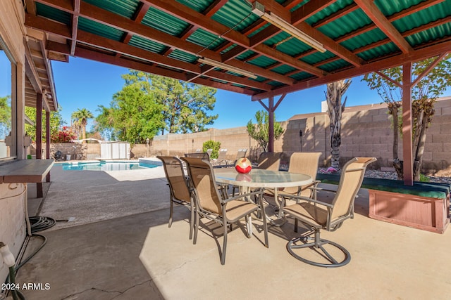 view of patio / terrace featuring a fenced in pool