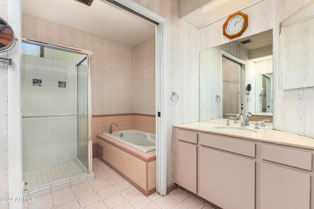 bathroom with separate shower and tub, tile patterned flooring, and vanity