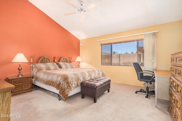 bedroom featuring ceiling fan, lofted ceiling, and carpet floors