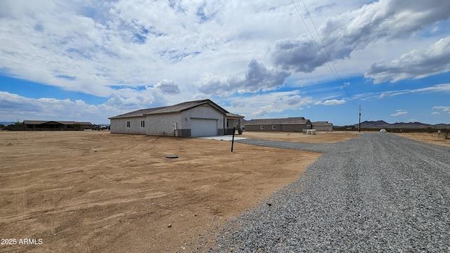 view of front of home with an attached garage and driveway