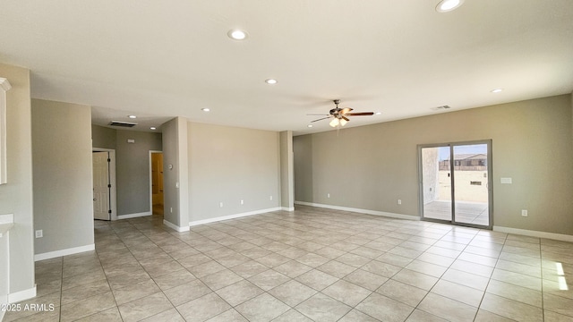 unfurnished room featuring a ceiling fan, light tile patterned floors, recessed lighting, and baseboards