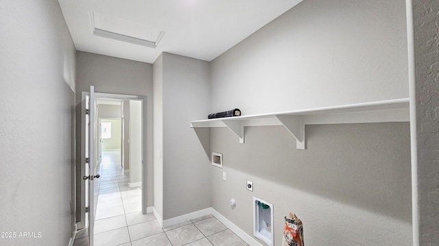 laundry room featuring washer hookup, electric dryer hookup, light tile patterned flooring, attic access, and gas dryer hookup