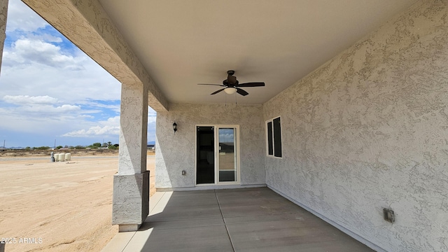view of patio / terrace featuring ceiling fan
