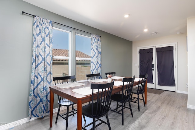 1635 W Cottonwood Bluffs Dr, Benson, AZ 85602 - dining room featuring light wood-style flooring, baseboards, and recessed lighting