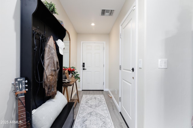1635 W Cottonwood Bluffs Dr, Benson, AZ 85602 - mudroom featuring light wood-style flooring and baseboards