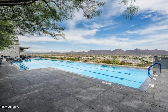 7180 E Kierland Blvd Unit 814, Scottsdale, AZ 85254 - community pool featuring a mountain view and a patio area