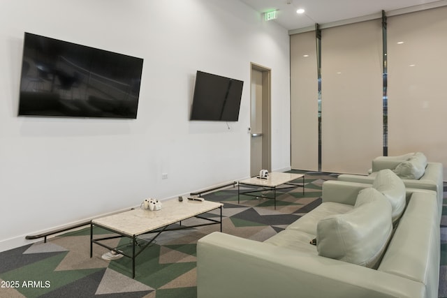 7180 E Kierland Blvd Unit 814, Scottsdale, AZ 85254 - carpeted living area featuring baseboards