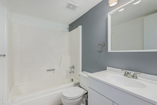 full bathroom featuring toilet, vanity, and tub / shower combination