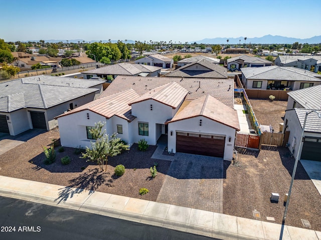 bird's eye view featuring a residential view and a mountain view