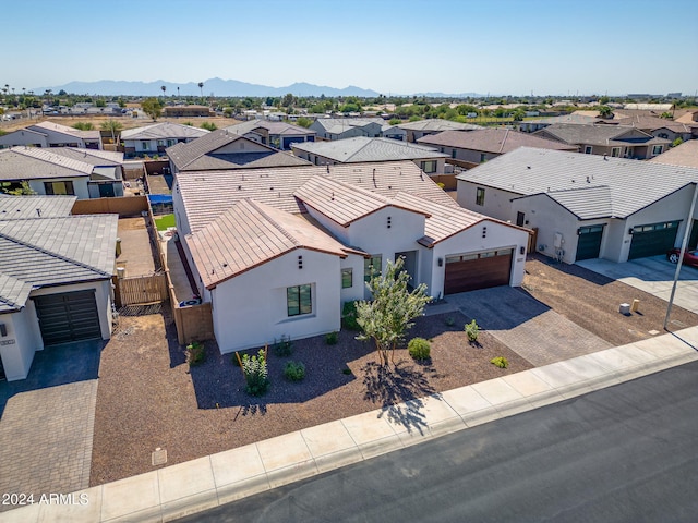 bird's eye view featuring a residential view and a mountain view