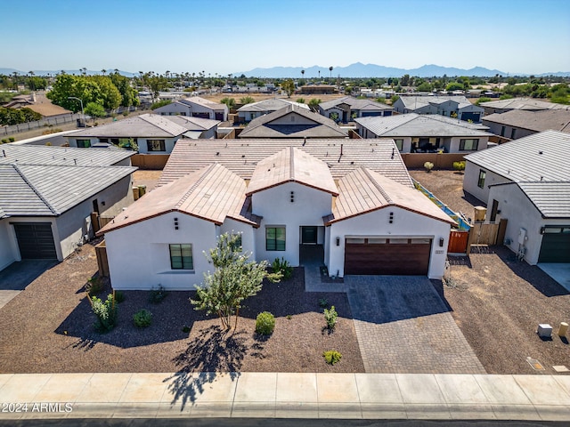 birds eye view of property featuring a residential view and a mountain view