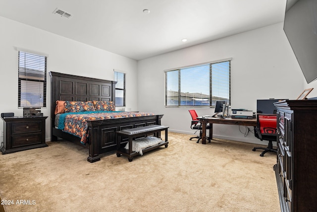 bedroom featuring light carpet, recessed lighting, visible vents, and baseboards