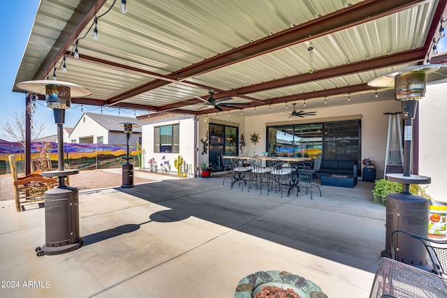 view of patio / terrace featuring ceiling fan and outdoor dining space