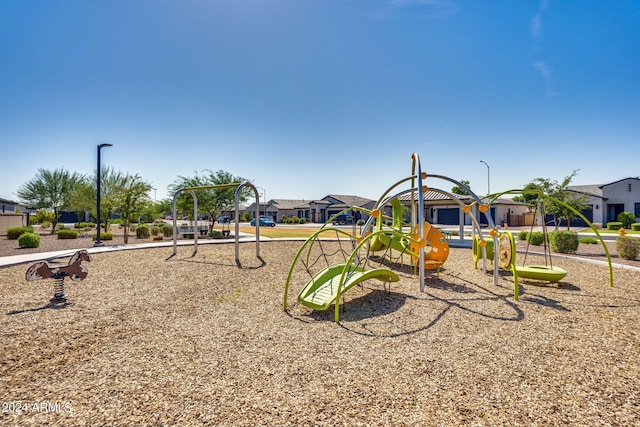 community play area featuring a residential view