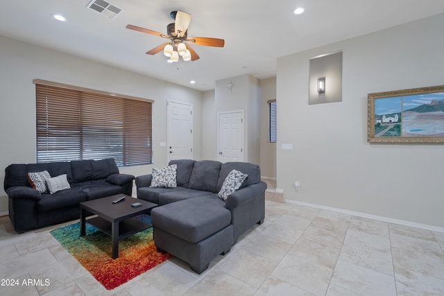 living room featuring ceiling fan