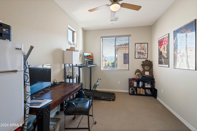 office space with carpet flooring and ceiling fan