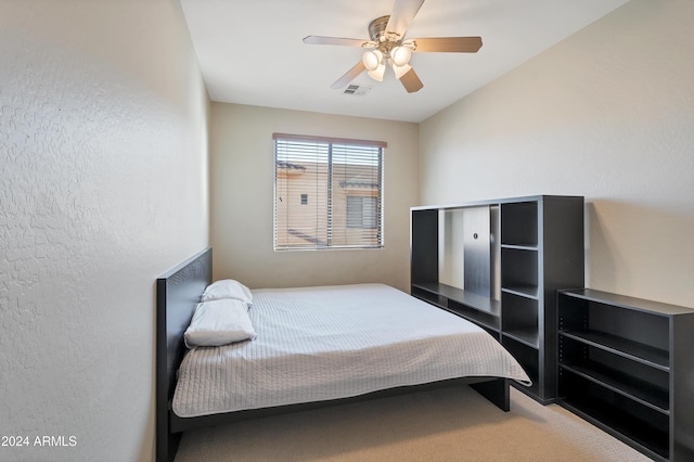 bedroom featuring ceiling fan and carpet floors