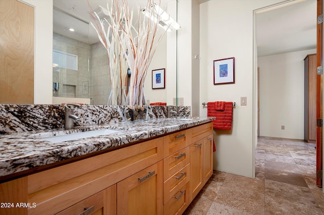 bathroom featuring vanity and walk in shower