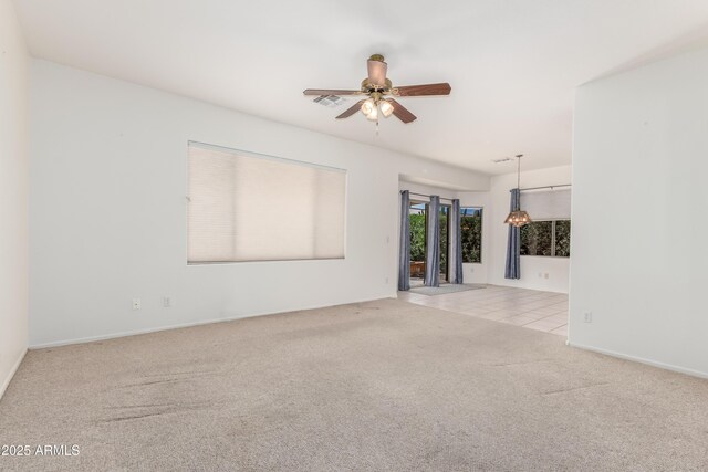 property entrance featuring a patio area, a tile roof, fence, and stucco siding