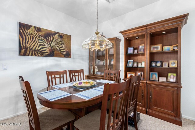 carpeted living room featuring a ceiling fan