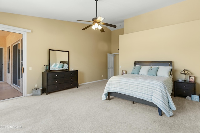 bedroom with light carpet, vaulted ceiling, and ceiling fan