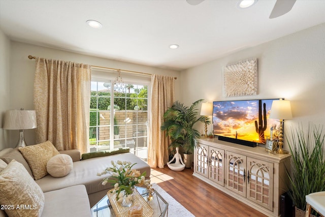 living room featuring recessed lighting and wood finished floors