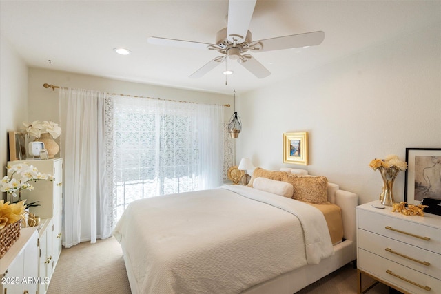 bedroom with recessed lighting, light carpet, ceiling fan, and access to exterior