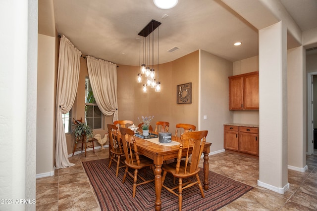 dining room with a chandelier