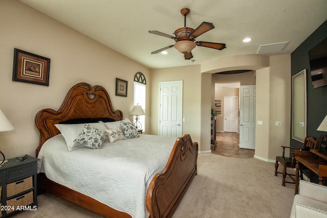 carpeted bedroom featuring ceiling fan