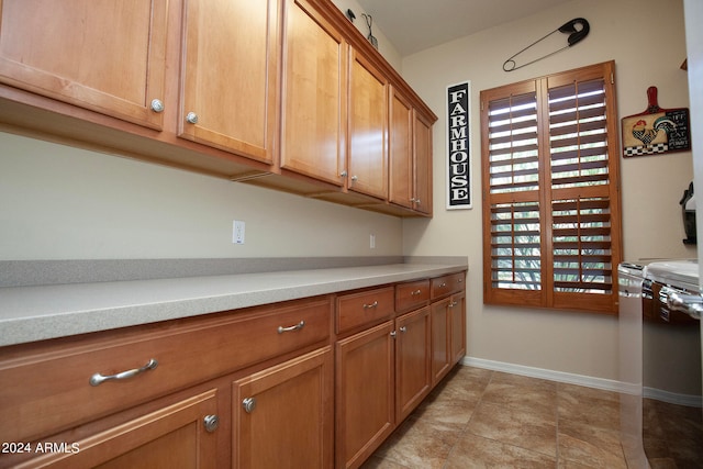 kitchen with light tile patterned floors