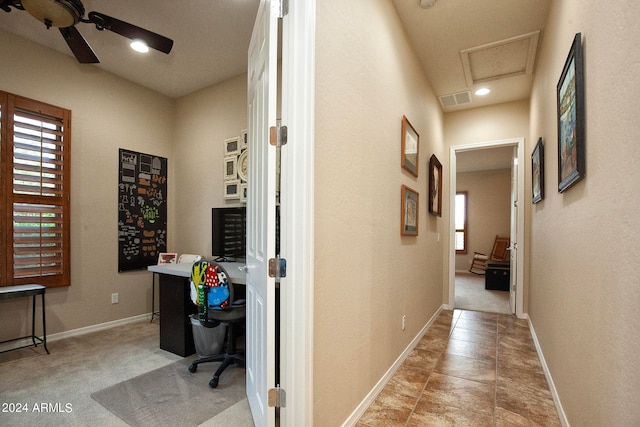 hallway with light carpet