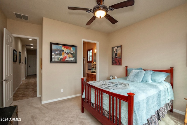 carpeted bedroom featuring ceiling fan