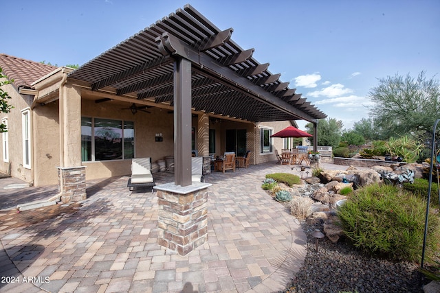 view of patio featuring a pergola and ceiling fan