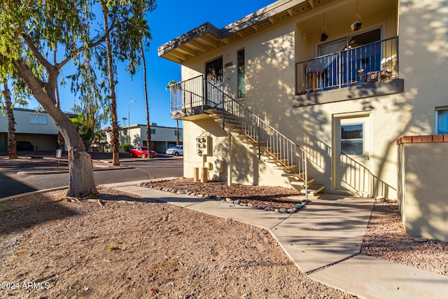 exterior space featuring a balcony