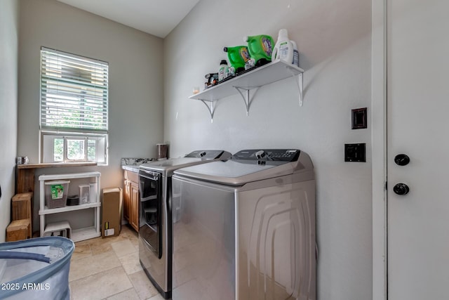 laundry area with laundry area and washer and dryer