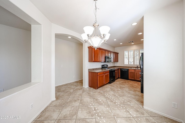 kitchen with arched walkways, a sink, black appliances, a chandelier, and recessed lighting