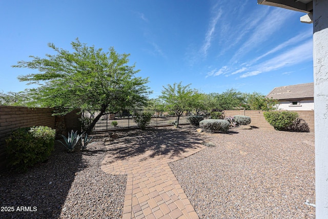 view of yard featuring a fenced backyard